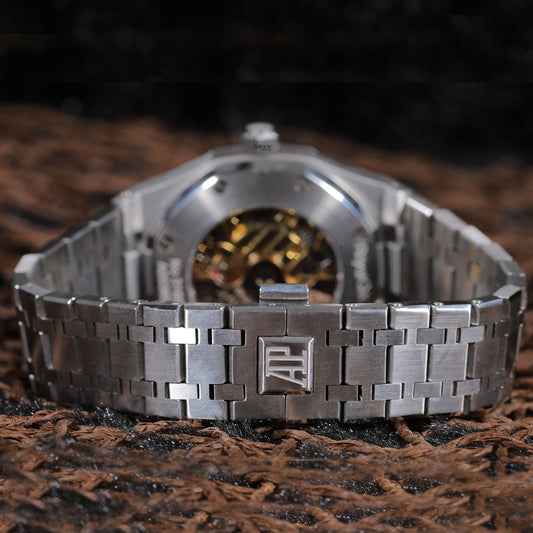 Stainless Steel Green Dial Luxury Watch with Emerald Accents and Open Heart Design SwanDiamond