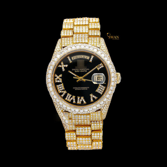 Full yellow gold iced-out watch with a black dial and a date and weekday display, a diamond-encrusted link band by swandiamond