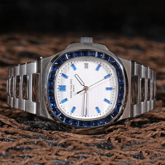 White Dial Luxury Watch with Blue Sapphire Accents and Stainless Steel Bracelet SwanDiamond