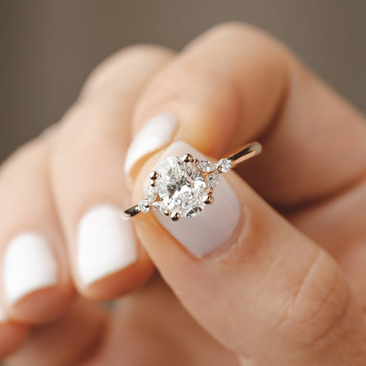 Oval Cut Mossanite Diamond Ring With Side Marquise Cut Diamonds