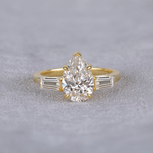 Pear Cut Lab Grown Diamond Engagement Ring in 18K Yellow Gold with Baguette Side Stones Three Stone Bridal Ring