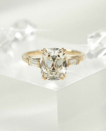 Cushion Cut Moissanite Diamond With Side Tapered Baguette Ring